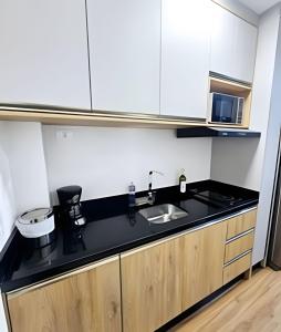 Apto com piscina aquecida e rooftop