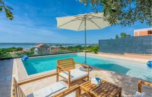 Four-Bedroom Holiday Home Maslenica With Sea View 01 - Ясенице