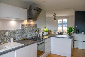 Appartements Helios - Appartement lumineux 65 m2 : photos des chambres