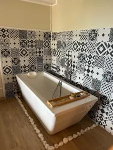 Chambre de charme Andria jacuzzi - 法雷诺