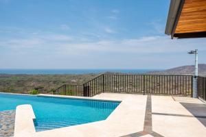 Luxurious Mountaintop Retreat with Ocean Views