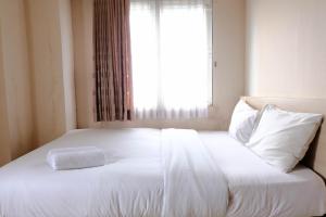 Simply Homey 2BR at 11st Floor Pinewood Apartment By Travelio - 4hvězdičkové hotely ve městě Sumedang