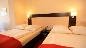 Family Room (2 Adults + 2 Children) room in Adesso Hotel