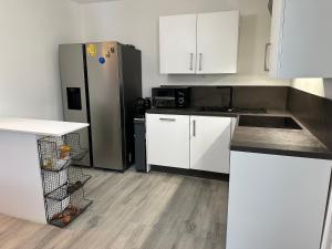 Maison individuelle à 8 minutes dOuistreham, quartier calme, transports en commun Tram & Bus, commerces de proximités