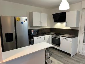 Maison individuelle à 8 minutes dOuistreham, quartier calme, transports en commun Tram & Bus, commerces de proximités