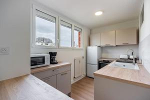 Appartements Le Chaleureux, Appartement fraichement renove : photos des chambres