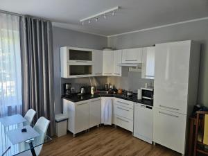 Apartament Olymp 113 z dwoma sypialniami i basenem