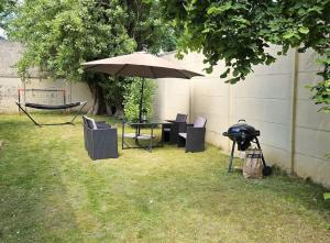 Séjour cosy avec parking privé dans la cour de la maison