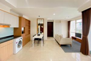Spacious and Combined 2BR at Menteng Park Apartment By Travelio