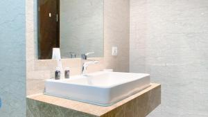 Modern and Elegant 2BR at Menteng Park Apartment By Travelio