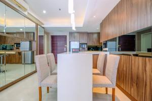 Comfort and Spacious 3BR Apartment at Casa Grande Residence By Travelio