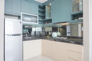 Elegant and Spacious 3BR at Ciputra International Apartment By Travelio