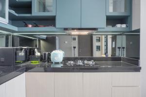 Elegant and Spacious 3BR at Ciputra International Apartment By Travelio