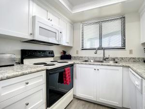 Ocean View with a beachfront pool at Ocean Trillium Condo ~ 602