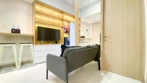 Nice and Comfortable 2BR at 20th Floor Tokyo Riverside Apartment By Travelio