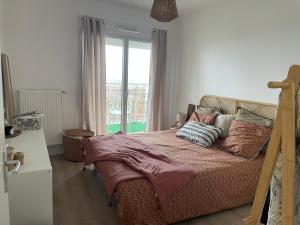 Appartements Bienvenue chez nous : photos des chambres