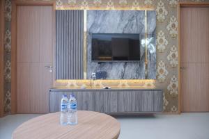 Nice and Comfy 2BR at Samara Suites Apartment By Travelio