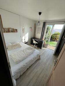 Maisons de vacances Maison de plain-pied au calme avec piscine : photos des chambres
