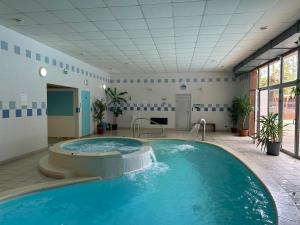 Maisons de vacances COTTAGE ENTRE CONTIS ET MIMIZAN PLAGE - Piscine chauffee et balneotherapie : photos des chambres