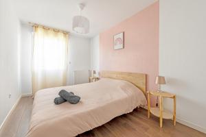 Appartements T3 avec terrasse et parking, a proximite de l-Aeroport et d-Airbus : photos des chambres