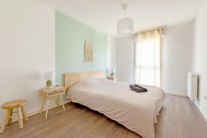 Appartements T3 avec terrasse et parking, a proximite de l-Aeroport et d-Airbus : photos des chambres