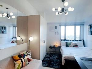 1BR Condotel Suite at SM Light Residences #LT01