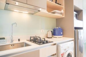 Cozy Stay Studio at Gold Coast Apartment By Travelio