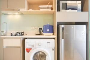 Cozy Stay Studio at Gold Coast Apartment By Travelio