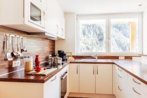 Three-Bedroom Apartment room in Ferienwohnen Mattle