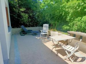 Maisons de vacances La Colline aux Oiseaux, La tranquillite des bois : photos des chambres