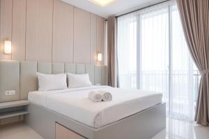 Nice and Comfort 1BR at 25th Floor Samara Suites Apartment By Travelio