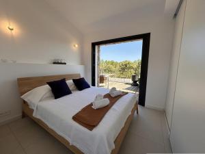 Villas Bergerie Piana d-architecte neuve, 8 pers, piscine chauffee, a 10 min plage : photos des chambres