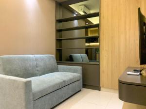 Nice 1BR at Gold Coast Apartment By Travelio