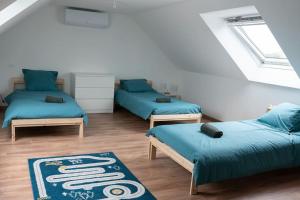 Maisons de vacances Jolie maison entierement renovee proche du bourg et des plages : photos des chambres