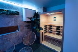 Appartements Loft 150 m2 Jacuzzi, Sauna et Massage : photos des chambres
