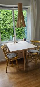 Tiny grey house with loft, 15 min from city center