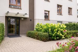 Metro Bemowo Apartment with Garden by BookingHost