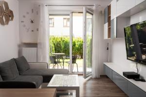 Metro Bemowo Apartment with Garden by BookingHost