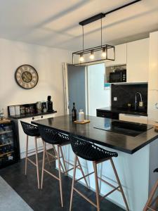 Appartements Havre de paix avec jardin et terrasse : photos des chambres