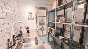 JoyJoyJoy the White Wilde ecolicious studio in a historic Canalhouse from 1799 with terrace at the canals