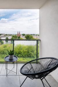 9th Floor Łódź Manufaktura Apartments with Parking by Rentujemy