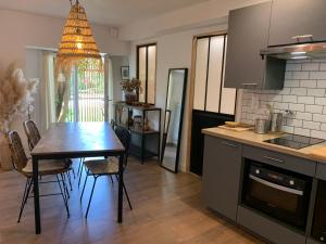 Appartements Les Logis de Candide : photos des chambres