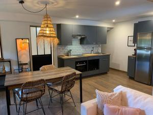 Appartements Les Logis de Candide : photos des chambres