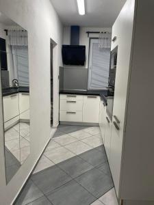 Byteček v rodinném domečku se sdíleným vchodem