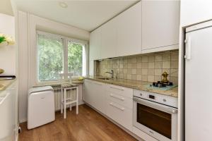 Stilingi apartamentai su virtuve Trakų miesto centre