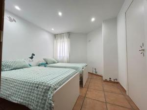 Apartamento frente al mar para dos familias