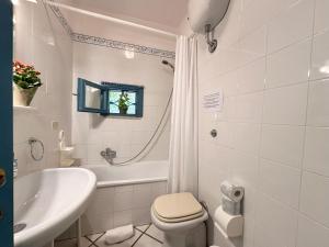 Blue shutters by the beach img48