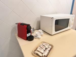 Blue shutters by the beach img14