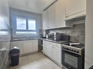 Appartements Le dix-septieme ciel vue sur la tour Eiffel : photos des chambres