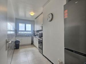 Appartements Le dix-septieme ciel vue sur la tour Eiffel : photos des chambres
